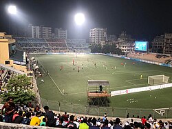 Cena de partida de futebol em Bangladesh